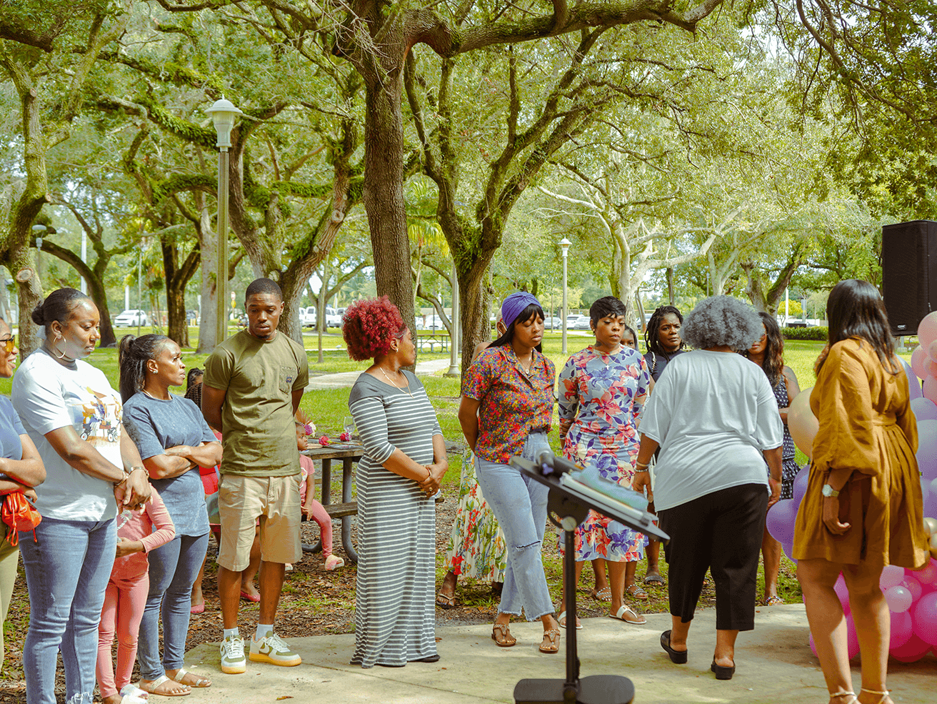 The God’s Redeeming Temple family at an outdoor community gathering