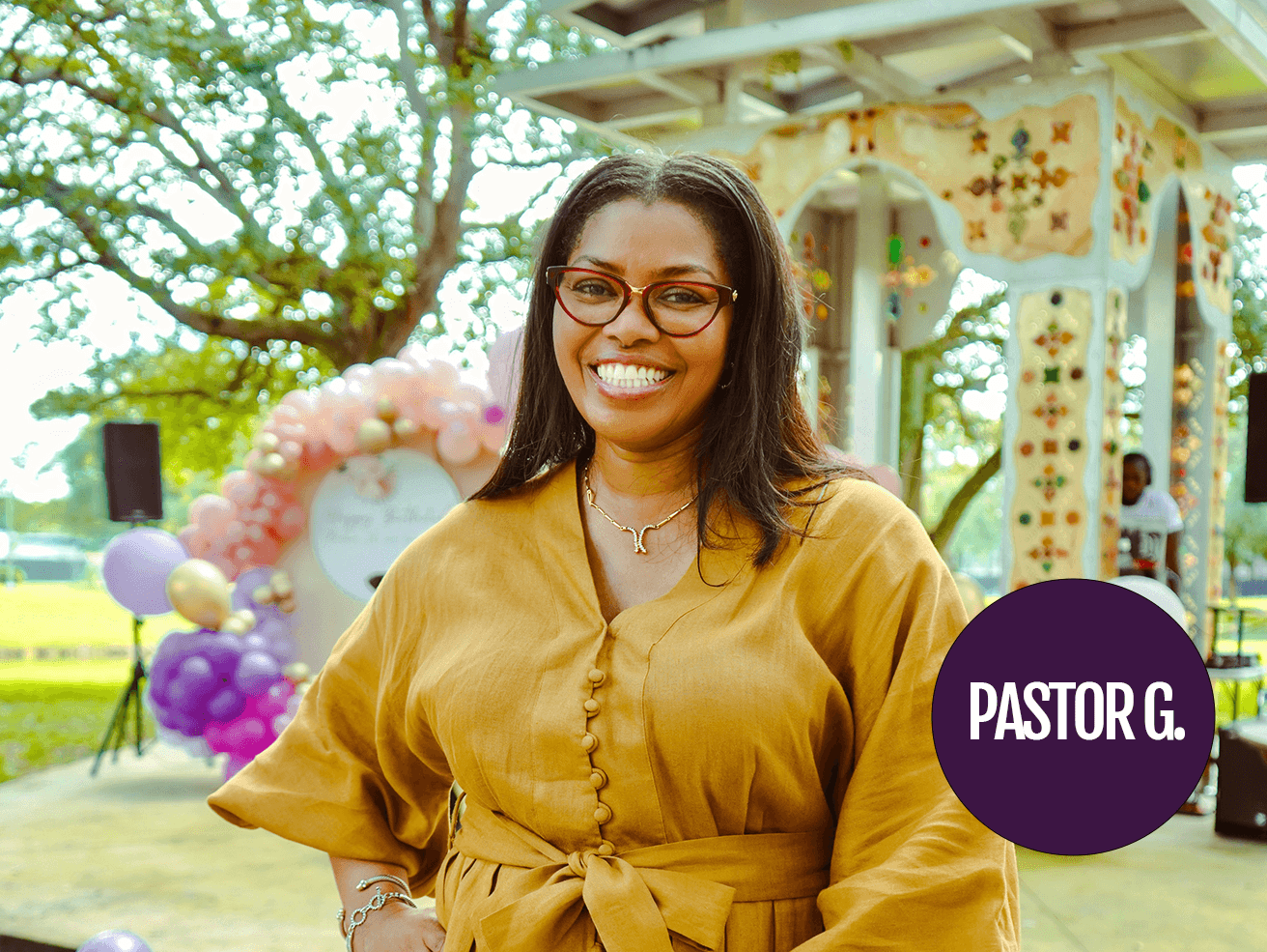 Pastor Yorie Gipson in yellow at an outdoor community event